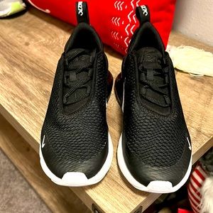 Size 3 boys Nike Air sneakers. Worn only once, great condition!